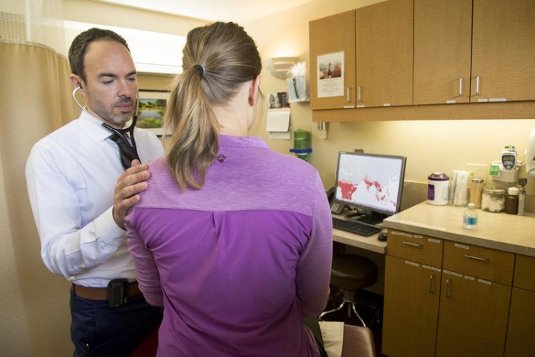 Dr. Seth Cohen with a patient. Photo credit: Clare McLean/UW Medicine.