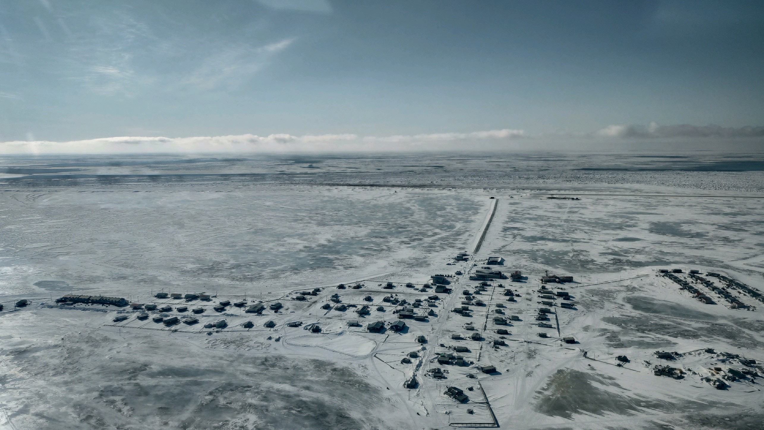 Above a snowy town's terrain in Alaska